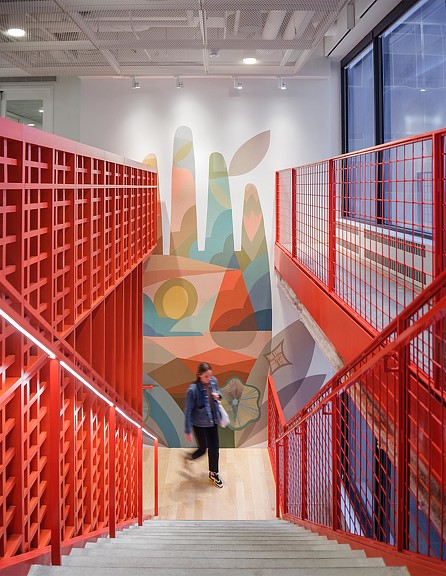 Gusto Denver staircase with red railing