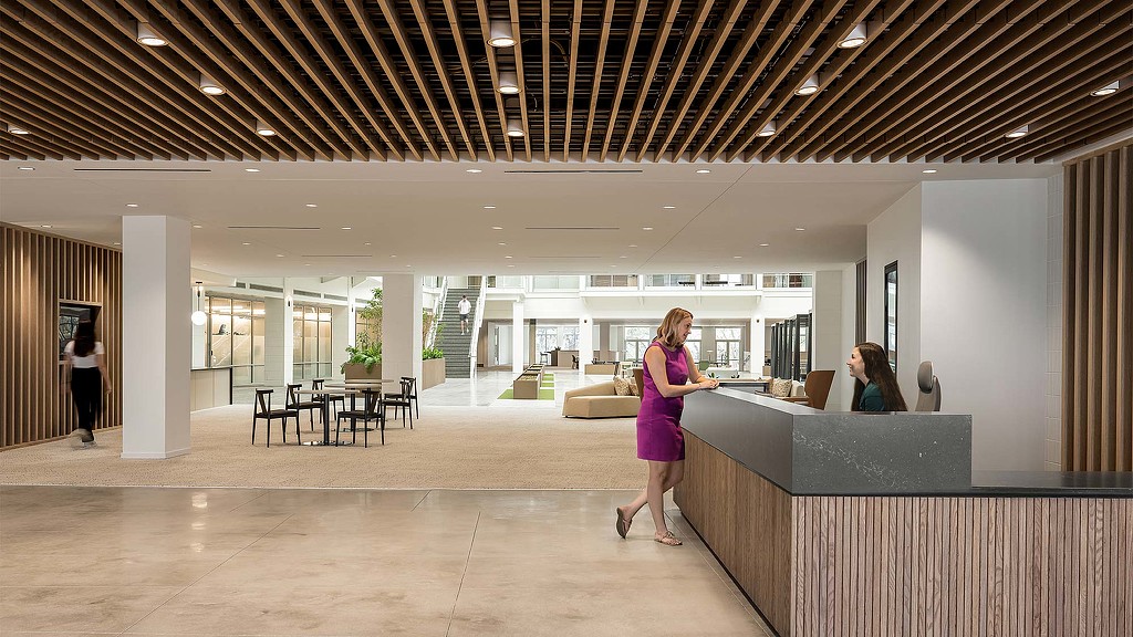 A woman standing in a room.