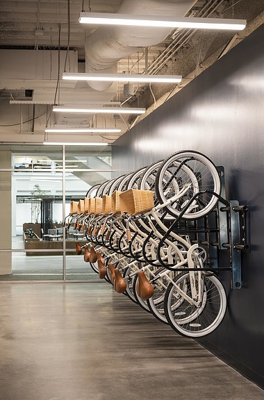A bicycle on a bike rack.