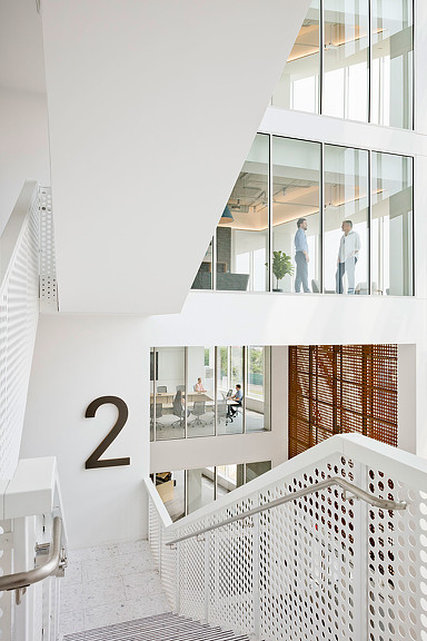 A group of people in a building.