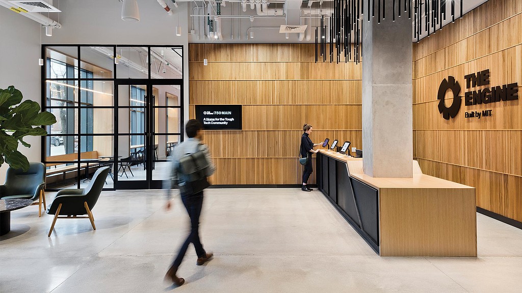 The Engine lobby with wood and matte black lacquer details.