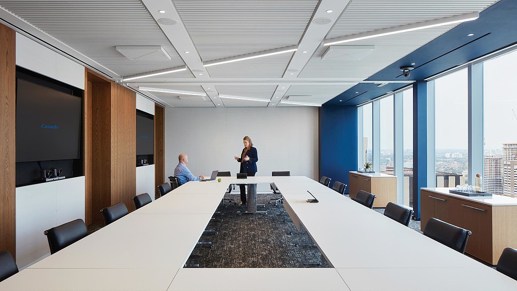 A man and woman in an office.