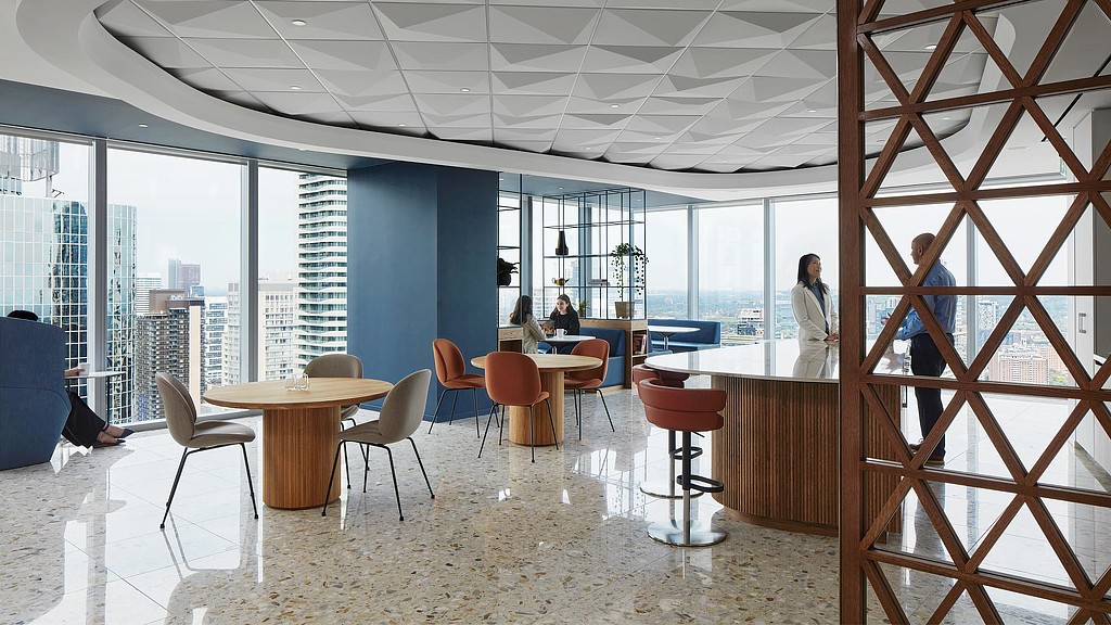A room with tables and chairs.