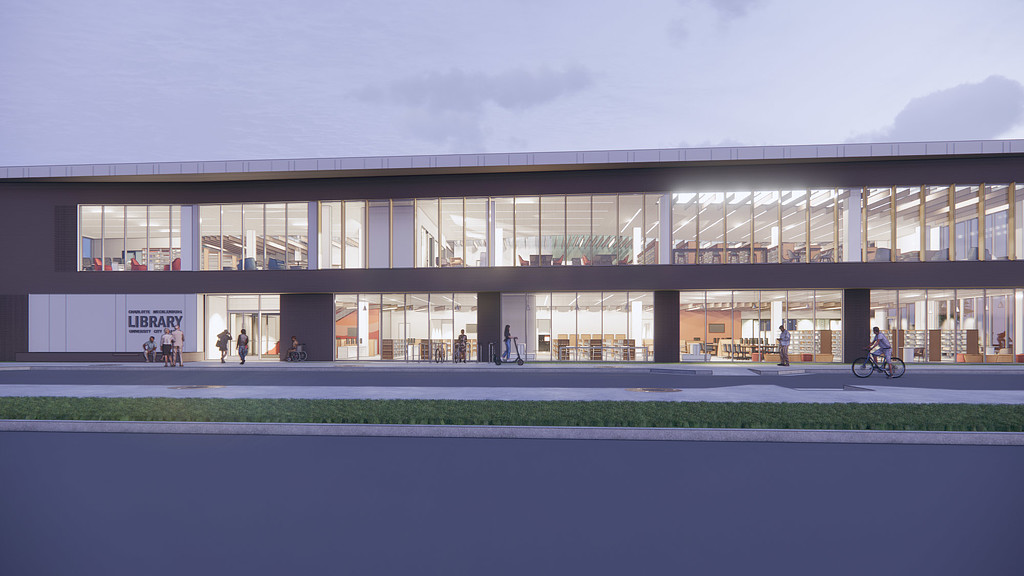 A building with a large glass front.