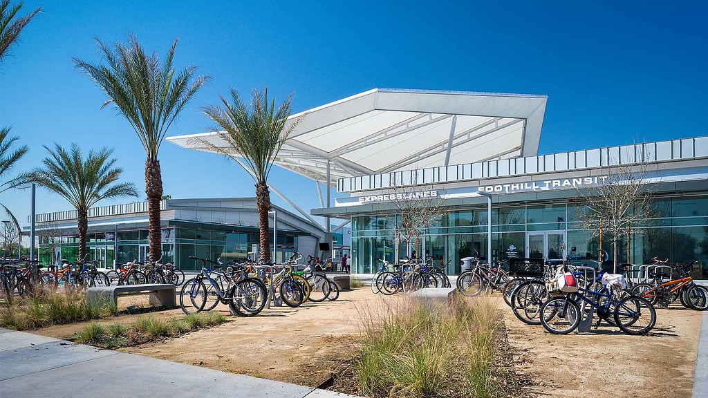 A group of bicycles parked outside a building.