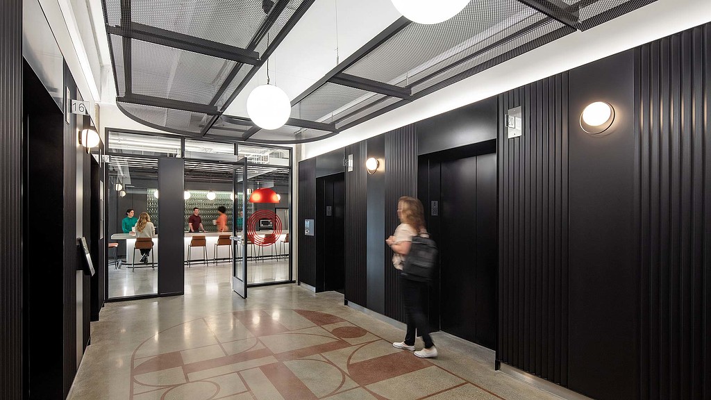 A person standing in a building.