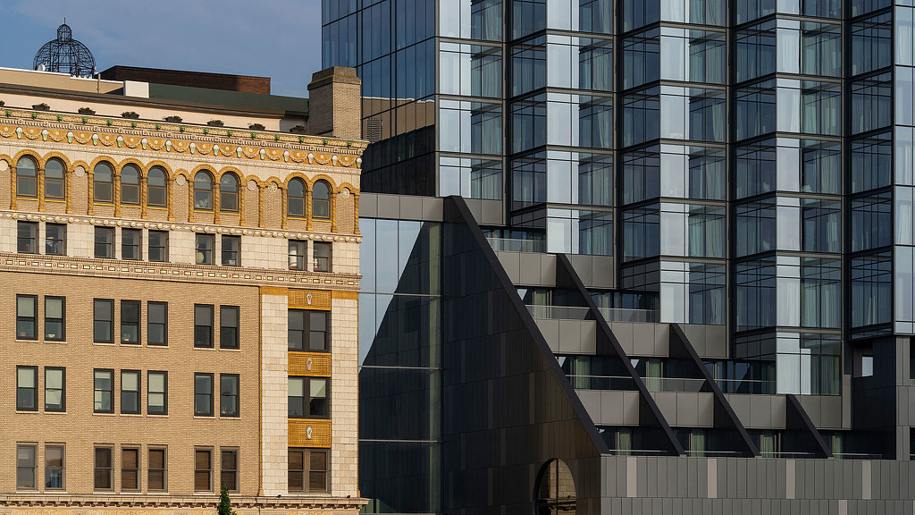 The Amway Grand Plaza Hotel next to the historic surroundings