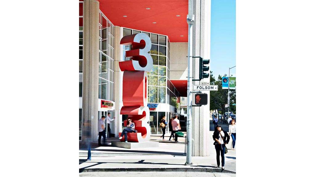 A large red sign on a building.