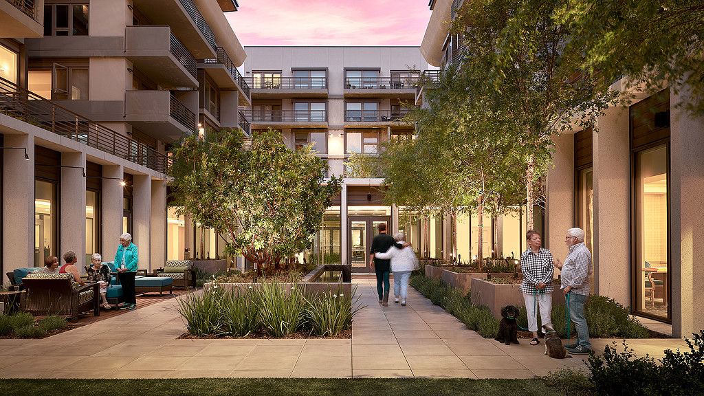 People walking on a sidewalk.