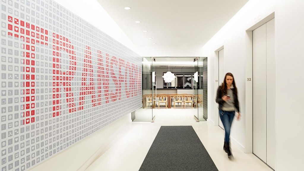 A person walking in a hallway.