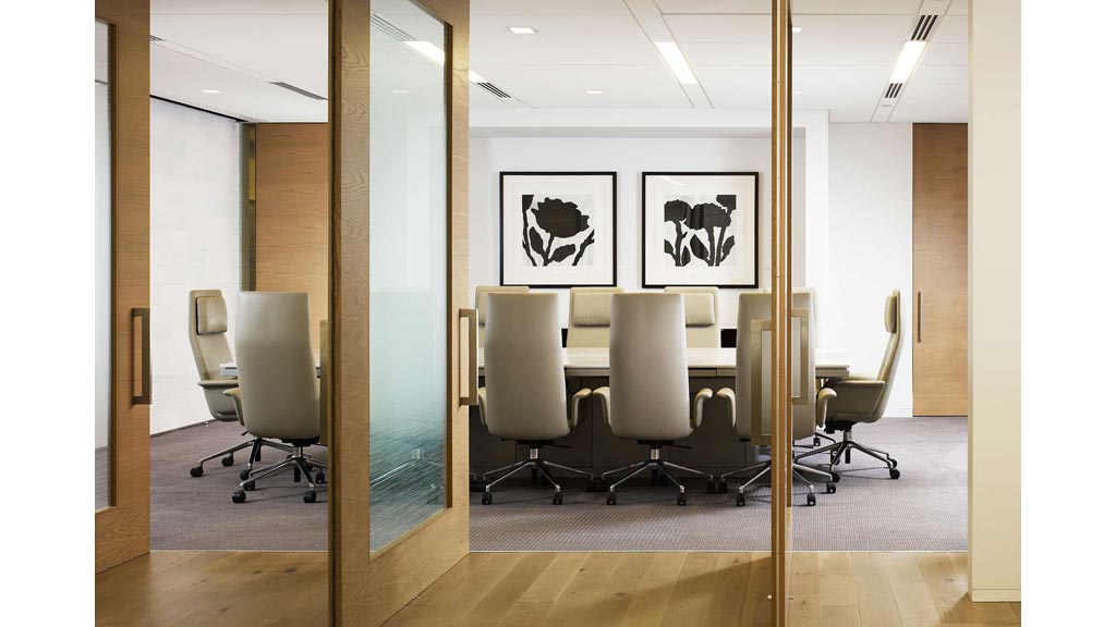 A room with chairs and a table.