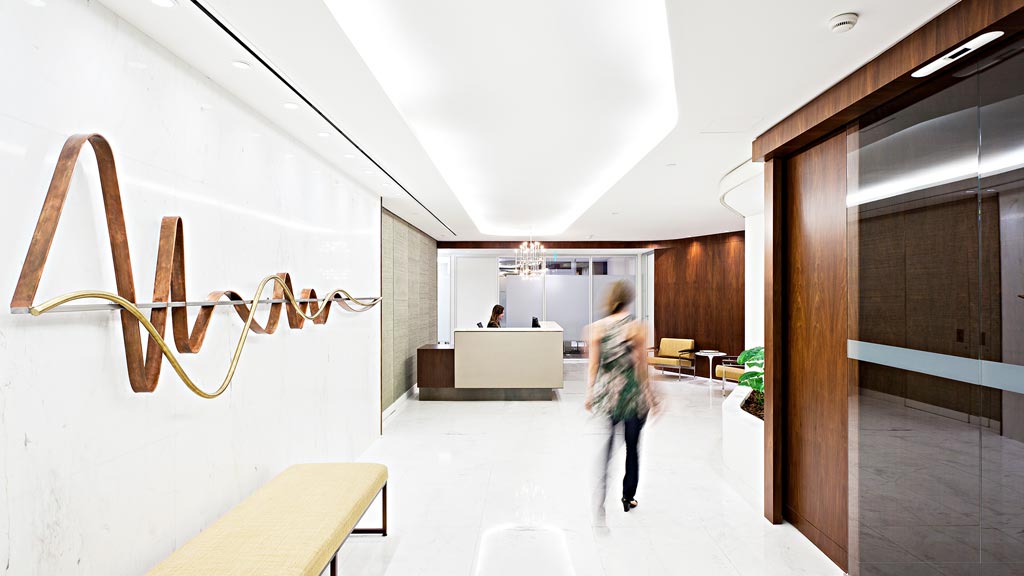 A person walking in a hallway.