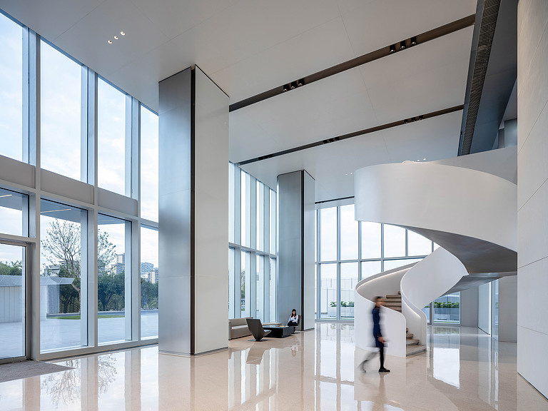 Highsun Headquarters interior with spiral staircase