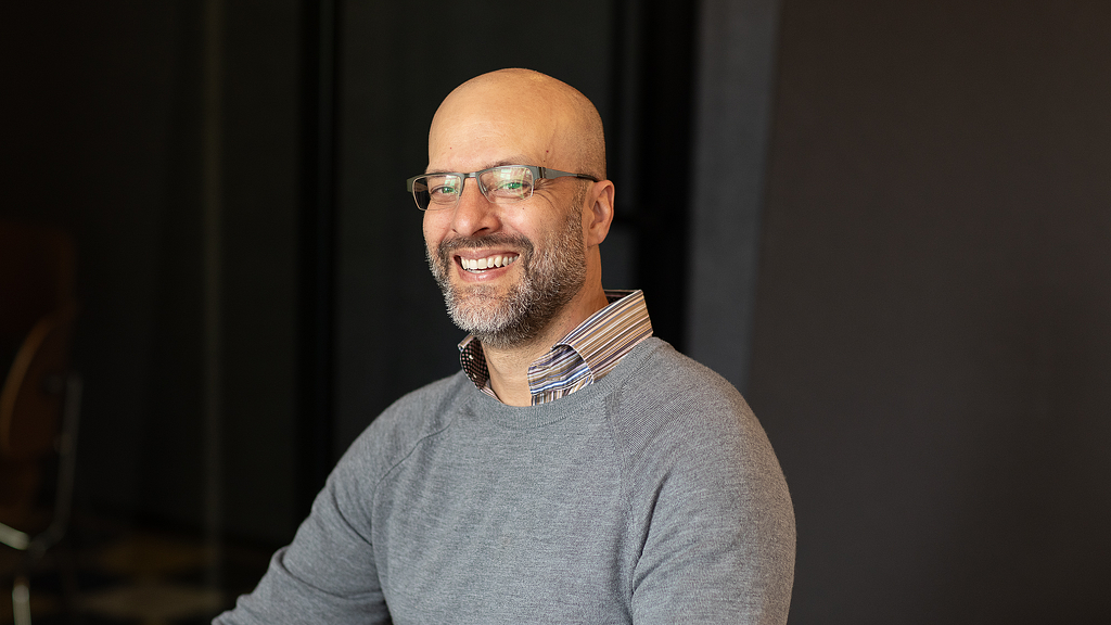 Gabe Hanson from the Gensler Minneapolis office on a dark background