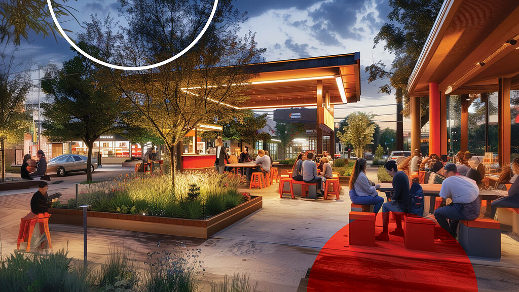 A group of people sitting outside.