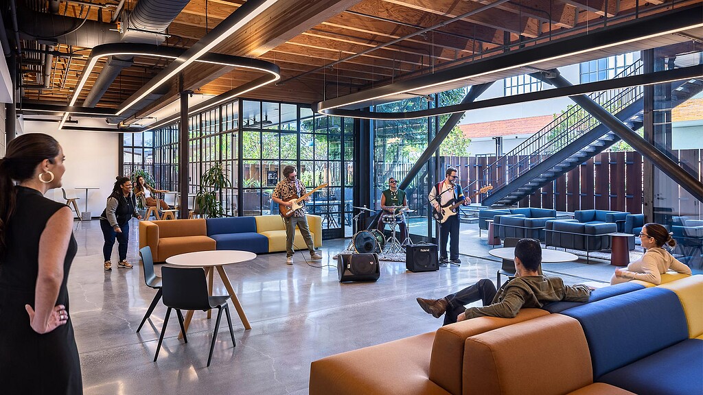 A band performing in the lounge at Universal Music Publishing Group.