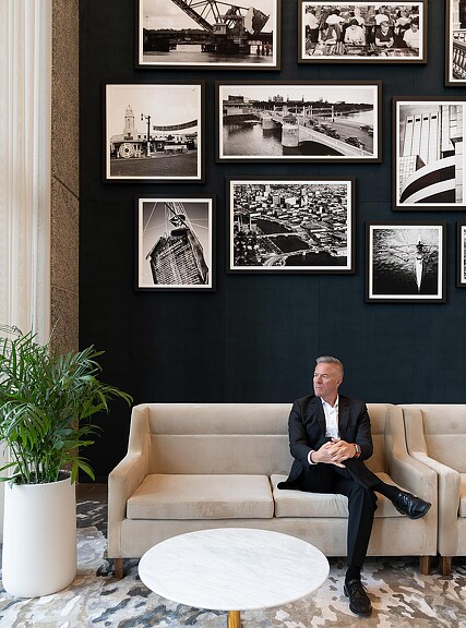 A person sitting on a couch.