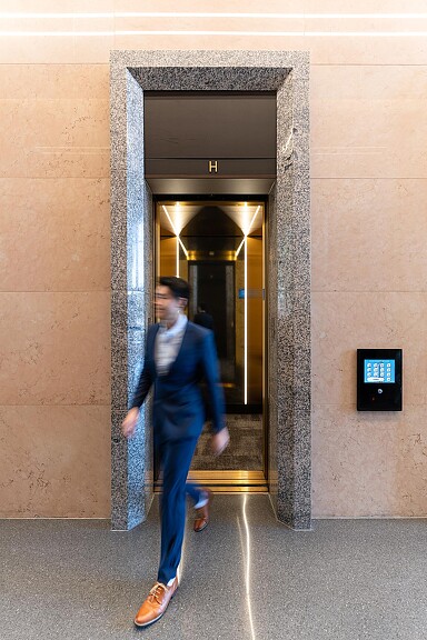 A person walking through a building.