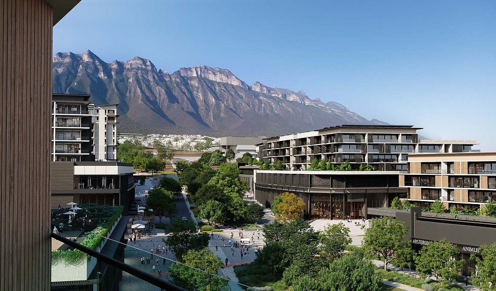 A city with a mountain in the background.