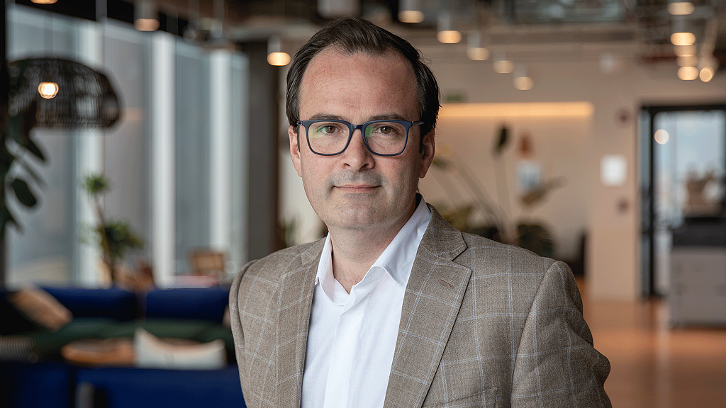 A man wearing glasses.