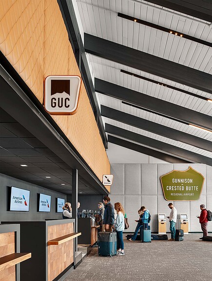 People standing in a building.