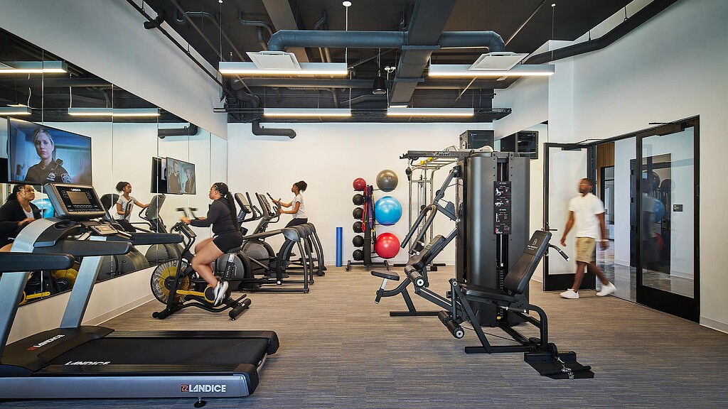 People working out in a room.