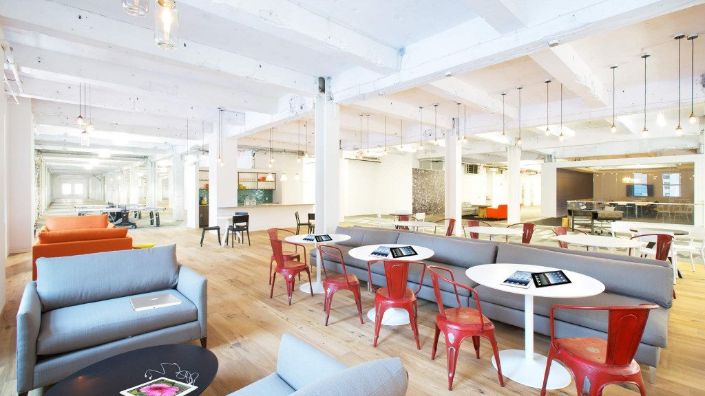 A room with tables and chairs.