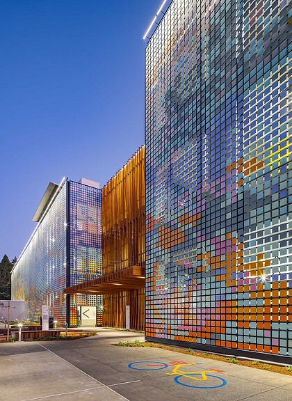 Angled view of Alta Garage kinetic artwork in the evening