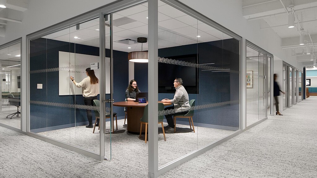 A group of people in an office.
