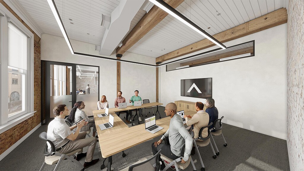 A group of people sitting around a table.