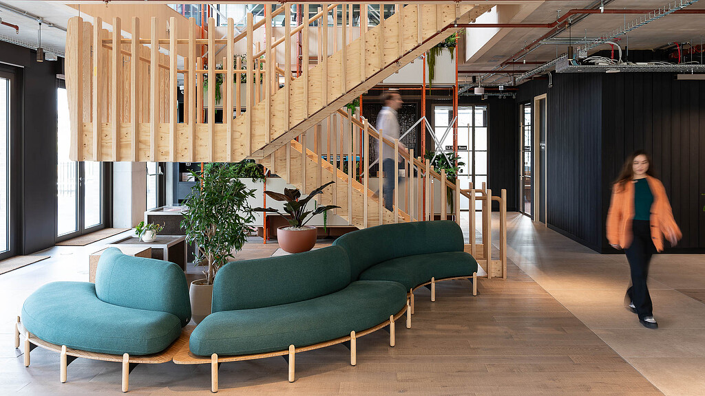 Buro Happold London workplace interiors with couch and staircase
