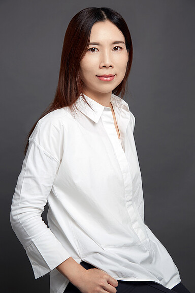 A person in a white shirt.