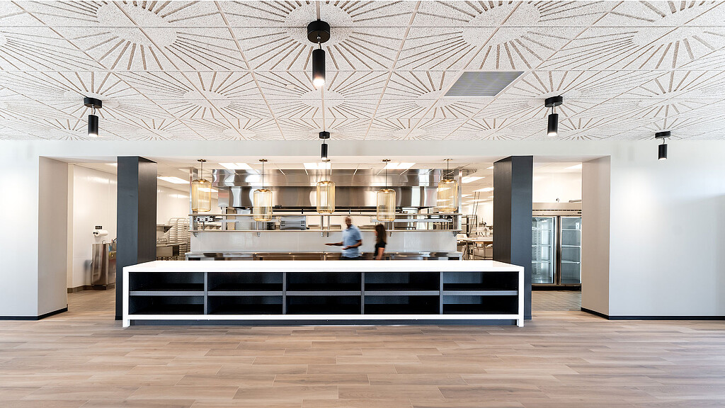 A large kitchen with a large counter.