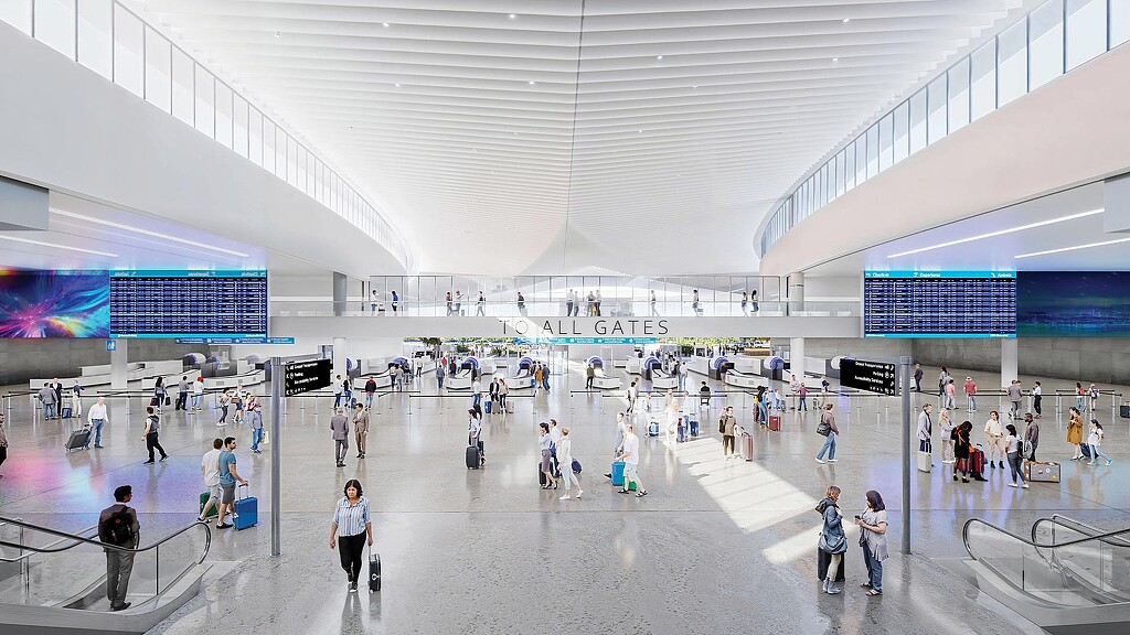 A group of people in a large building.