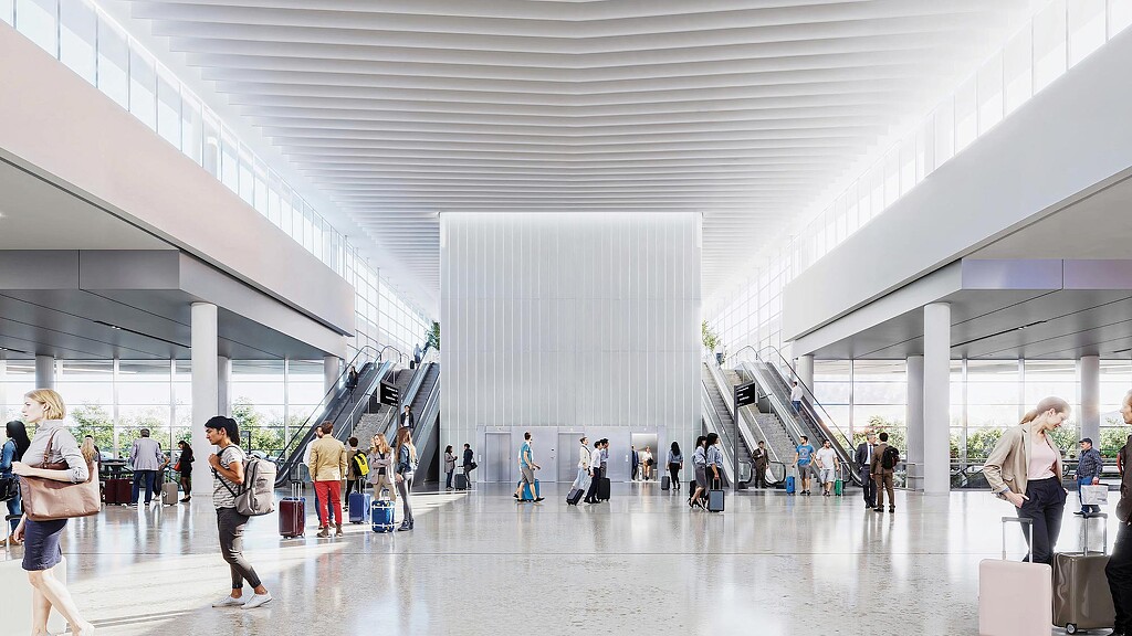 People walking in a large building.