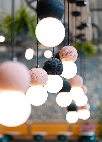 Close-up of pink and black light fixtures
