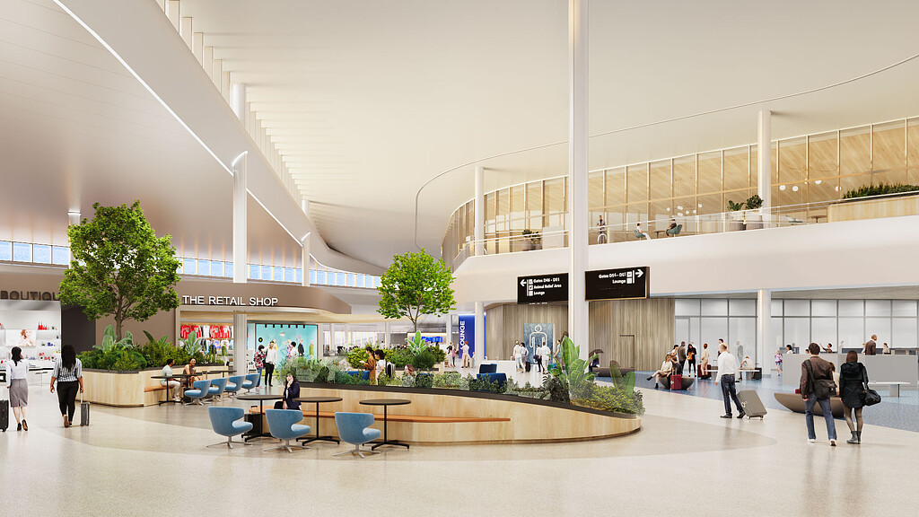 A group of people walking around a building.