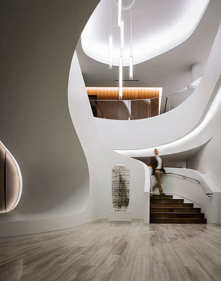 A person standing on a staircase.