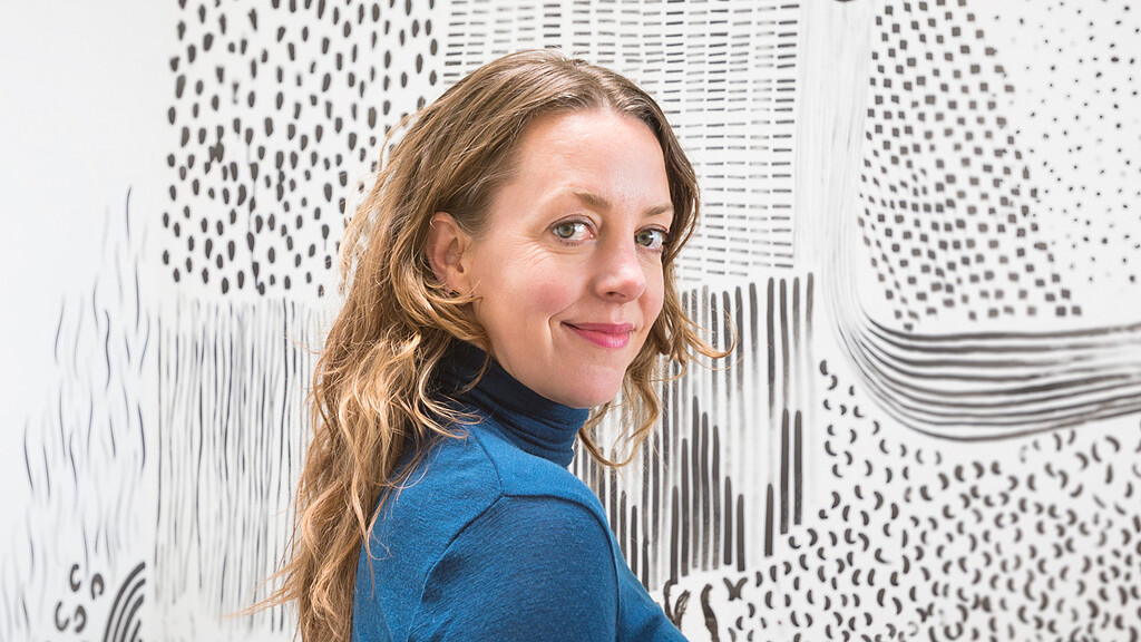 A woman with long hair.