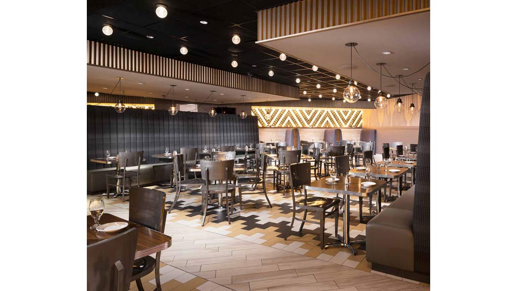 A room with tables and chairs.