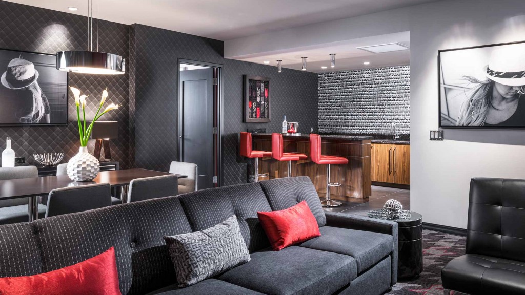 A living room with a couch and a table.