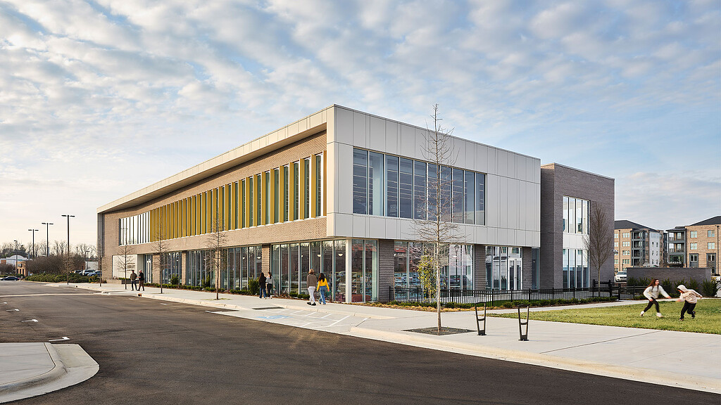 A building with people walking around.