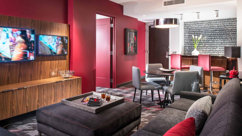 A living room with a tv and couches.