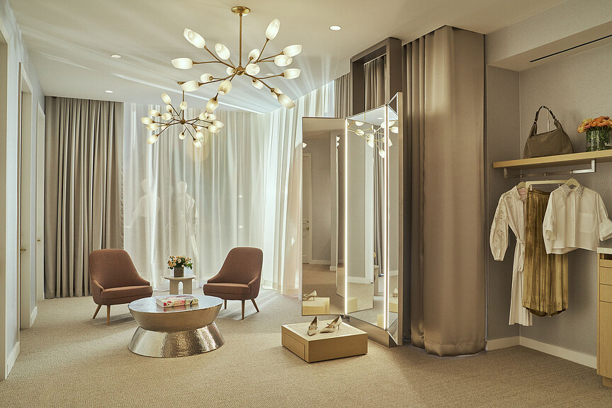 Wilkes Bashford store interior with light fixtures and dressing mirror