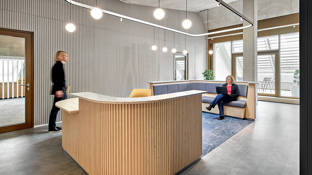 A person sitting on a couch.