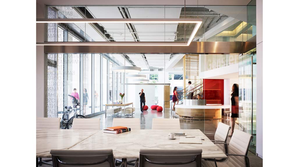 A room with a table and chairs.