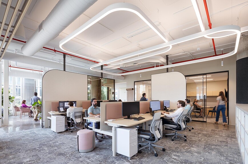 A group of people in an office.