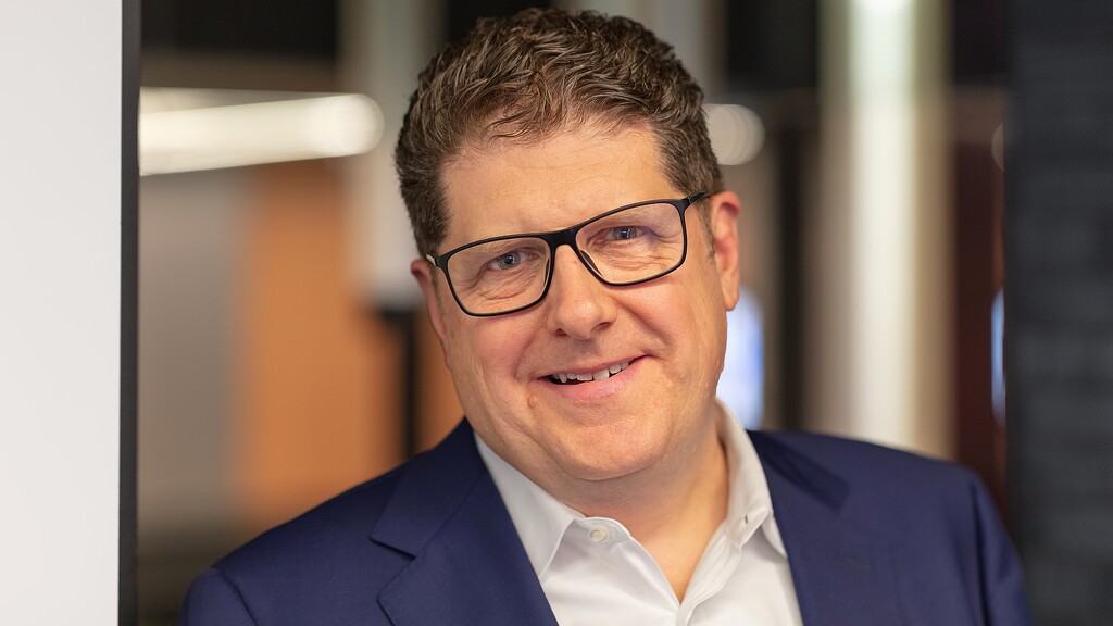 A man wearing glasses.