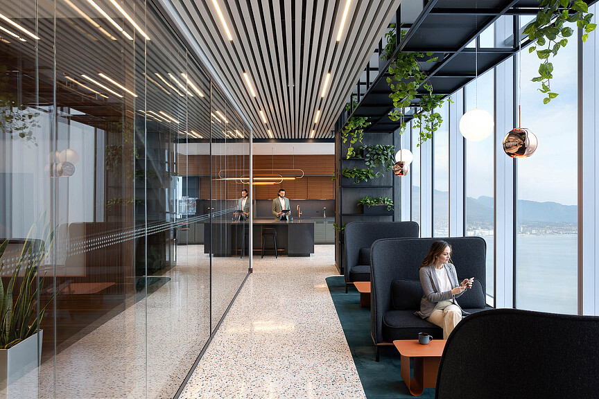 A person sitting on a couch.