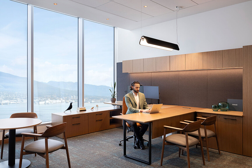 A person sitting at a desk.